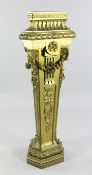 A Louis XVI style carved giltwood pedestal, of triangular outline with floral swags, acanthus