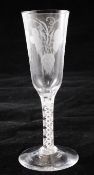 A double series opaque twist ale glass, c.1765, the pointed round funnel bowl wheel engraved with