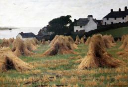 Joshua Anderson Hague (1850-1916)oil on canvas,Coastal village viewed from a cornfield,signed,32 x