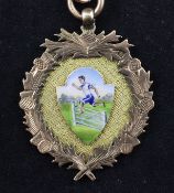An Edwardian 9ct gold and enamel cross country presentation medal, with enamelled plaque on a