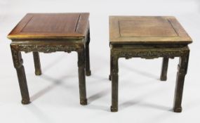 A pair of 19th century Chinese rosewood square topped stands or low tables, with traditional blind