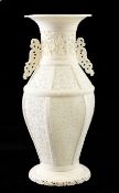 A Chinese ivory hexagonal baluster vase, 19th century, the side panels pierced and carved in low