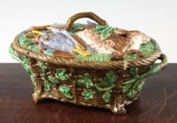 A Minton Majolica game pie tureen and cover, the cover modelled in high relief with dead game, the