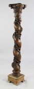 An 18th / 19th century Spanish carved walnut column, with barley twist with entwined grapes and