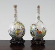 A pair of Chinese famille rose eggshell porcelain miniature bottle vases, Qianlong seal mark,
