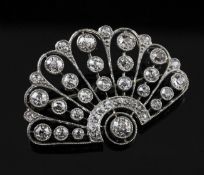 A 1940`s white gold and millegrain diamond set brooch, modelled as a fan, 1.25in.