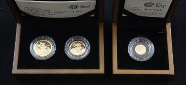 A Royal Mint 2009 gold proof quarter sovereign and a 2009 gold proof half and full sovereign set,