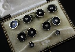 An Edwardian 9ct & 18ct gold, black onyx and diamond set eight piece dress stud set, of octagonal