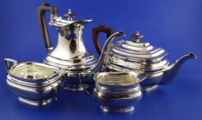 A matched modern four piece silver tea and coffee set, of rounded rectangular form, Roberts & Belk,