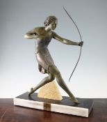 A French Art Deco patinated model of Diana the Huntress, on a rectangular marble and onyx base, 22.