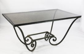 A Continental wrought iron rectangular dining table, with inset smoked glass top, 5ft x 2ft 10in.