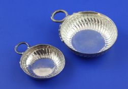 A late 18th century French silver taste vin, with embossed fluted decoration, indistinct maker`s