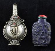 A Chinese lapis lazuli snuff bottle and a Tibetan style white metal snuff bottle, the lapis lazuli