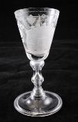 A Continental double hour glass stem goblet, 18th century, the bucket shaped bowl wheel engraved