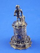 A 19th century Austro-Hungarian? silver model of a knight upon a cylindrical pedestal with paua