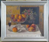 J C Howittoil on canvas,Still life of fruit and a decanter on a table top,signed and dated 1936,12.