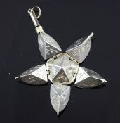 A 9ct gold and silver masonic ball pendant, opening into a star shape, closed 1in.