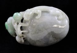 A Chinese jadeite carving, late 19th / early 20th century, carved in high relief and openwork with