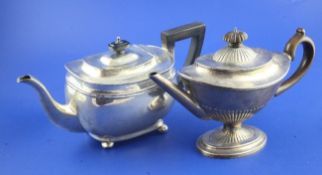 A Victorian demi fluted silver boat shaped pedestal teapot by Charles Stuart Harris, and a later