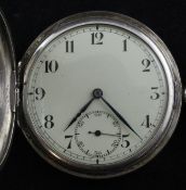 A 1930`s silver half hunter keyless lever Record pocket watch, with Roman chapter ring, Arabic dial