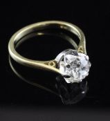 An 18ct gold and solitaire diamond ring, the old cut stone weighing approximately 1.90ct, size M.
