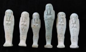 Six Egyptian turquoise glazed faience shabti, Amasis II period c. 6th century BC, each impressed