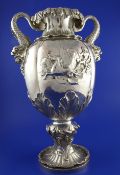 An ornate large Victorian silver two handled vase by Charles Reily & George Storer, of baluster