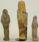 Two Egyptian faience shabti and a terracotta mother and child group, c.5th-3rd century BC, the