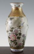 A Japanese Kutani porcelain ovoid vase, Meiji period, finely painted with birds amid foliage,