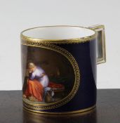 A Meissen coffee can, Marcolini period c.1800, painted to an oval reserve with a titled vignette of