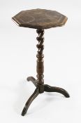A William and Mary oak candle stand, the octagonal top with inlaid decoration, with barley twist
