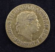 A George III 1820 gold full sovereign, (VG/F).