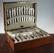 An almost complete early 20th century American sterling silver fancy pattern canteen of cutlery for