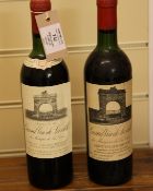 Two bottles of Chateau Leoville-Las-Cases, St. Julien, including one 1961, high shoulder; and one
