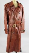 A chestnut brown leather trench coat, retailed by Harrods, with olive green satin lining, suitable