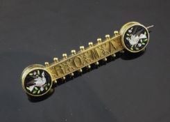 A 19th century gold and micro mosaic bar brooch, inscribed ""Roma"" with two panels decorated with
