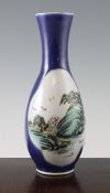 A Chinese blue ground pear-shaped vase, Kangxi mark, late 19th century, painted to shaped reserves