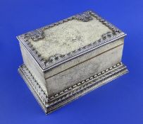 A George V silver mounted shagreen casket by Omar Ramsden, of rectangular form, with scroll borders