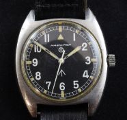 A gentleman`s stainless steel Hamilton military wrist watch, with black Arabic dial with broad