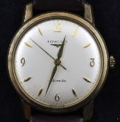 A gentleman`s 9ct Longines automatic wrist watch, with baton and quarterly Arabic numerals, on