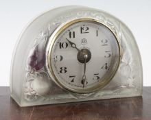 A Rene Lalique Moineaux pattern mantel clock, designed c.1924, the arched case inset with an ATO