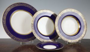 A Mintons bone china fifty two piece part dinner service, early 20th century, each piece with