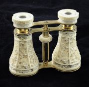 A pair of late 19th century Chinese carved ivory and lacquered brass opera glasses by Arthur