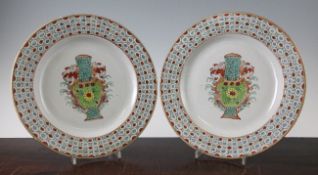 A pair of unusual Chinese export famille rose dishes, Qianlong period, each painted to the centre