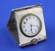 A George V silver mounted nickel cased 8-day travelling timepiece, with rectangular case and