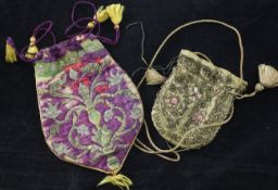 Two silk draw string purses, 17th - 19th century, the first 17th century purse worked with flowers