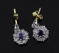 A pair of 18ct gold, sapphire and diamond cluster drop ear studs, of circular form, 0.5in.