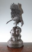 A large Japanese bronze model of an eagle, 19th century, the eagle with outstretched wings and
