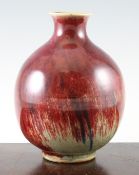 A Chinese flambe glazed globular vase, late 19th / early 20th century, with purple, blue, pale