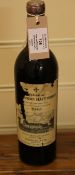 One bottle of Chateau La Mission Haut-Brion 1945, Graves; high shoulder, cellar-soiled label with